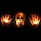 8.5" Lighted Orange Skull & Hands Outdoor Halloween Decoration